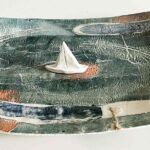 Piatto in ceramica con barca a vela
